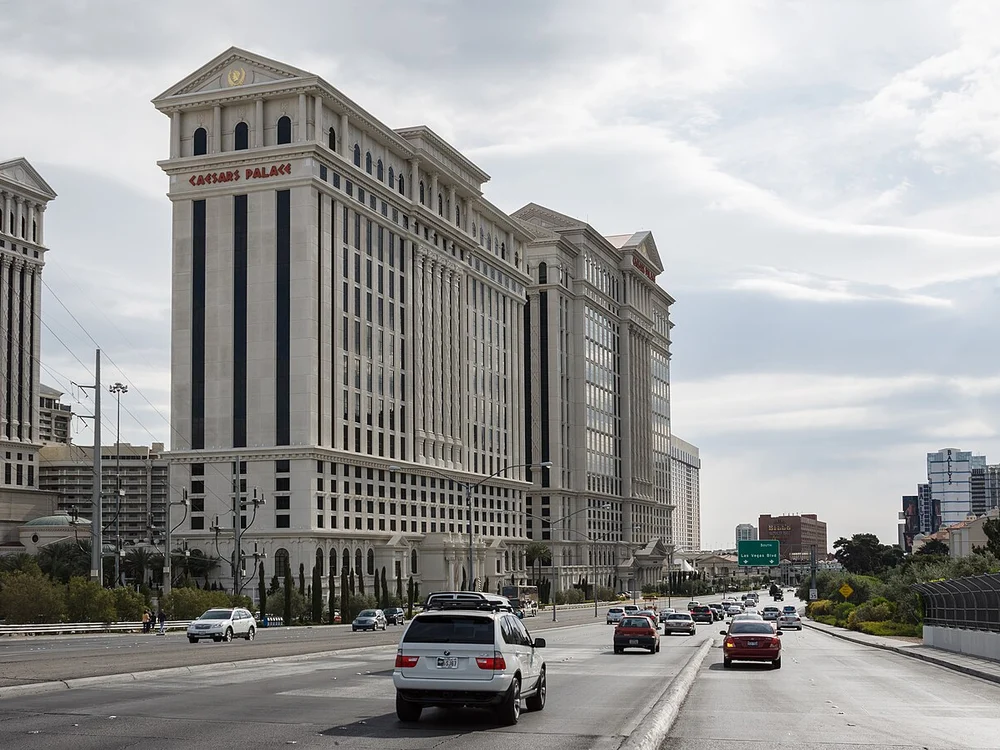 Augustus tower and Roman statue fountain entrance along Las Vegas Blvd