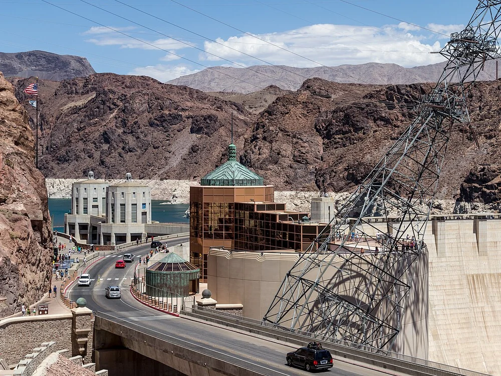 Massive concrete curve of Hoover Dam holding back Lake Mead