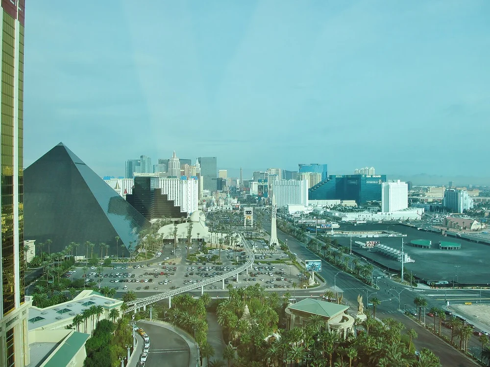 Golden glass facade of Mandalay Bay rising over the South Strip