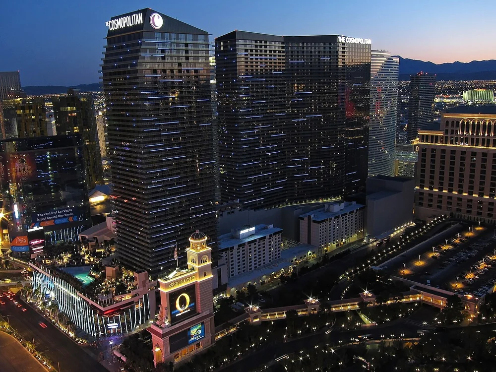 Multi-story Chandelier art lounge and glass tower facade
