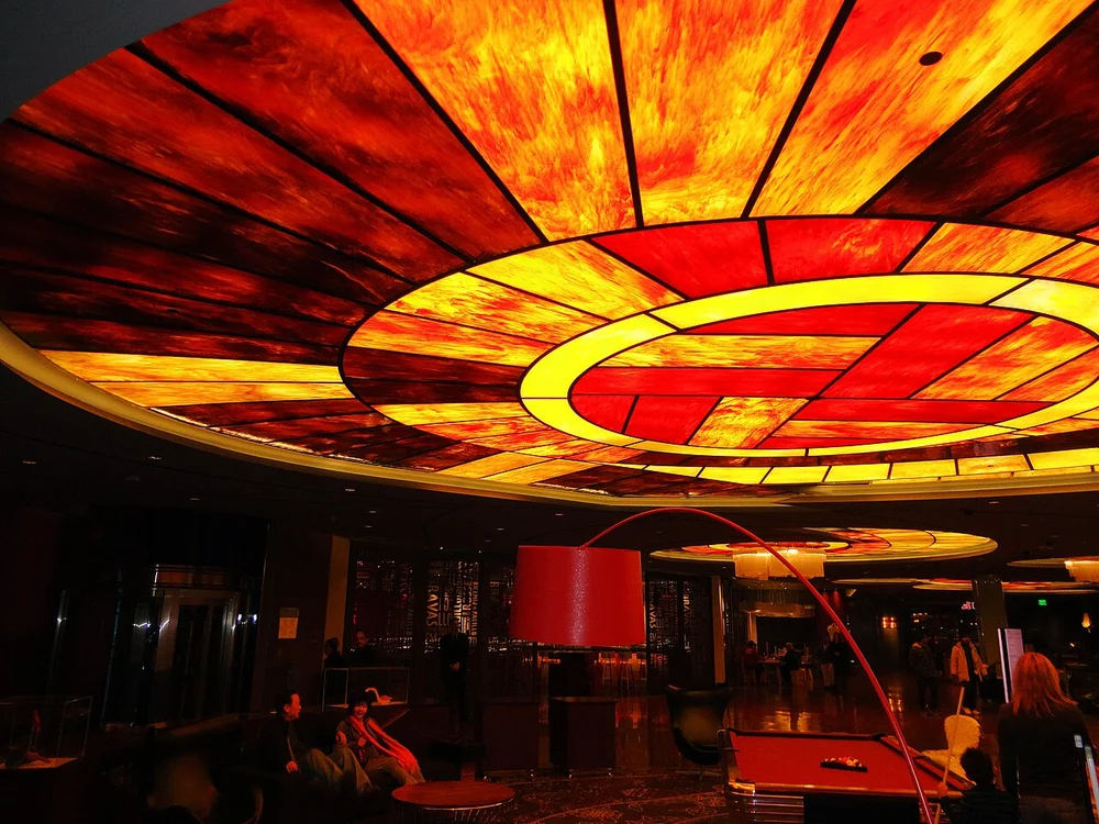 Digital media column check-in lobby with rotating art screens